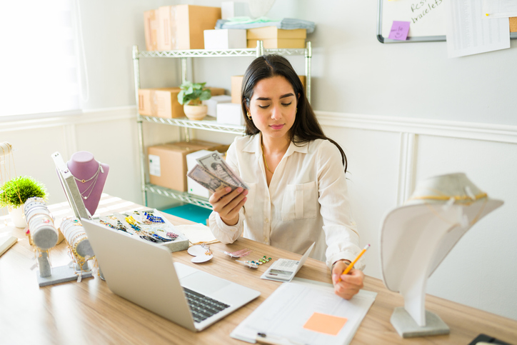 An investor calculates how to make $100,000 per year in passive income.