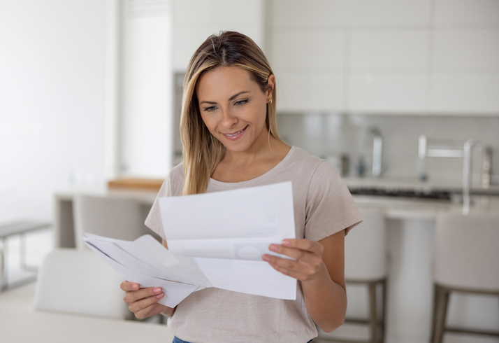 An investor reviewing documents about a tax lien property.