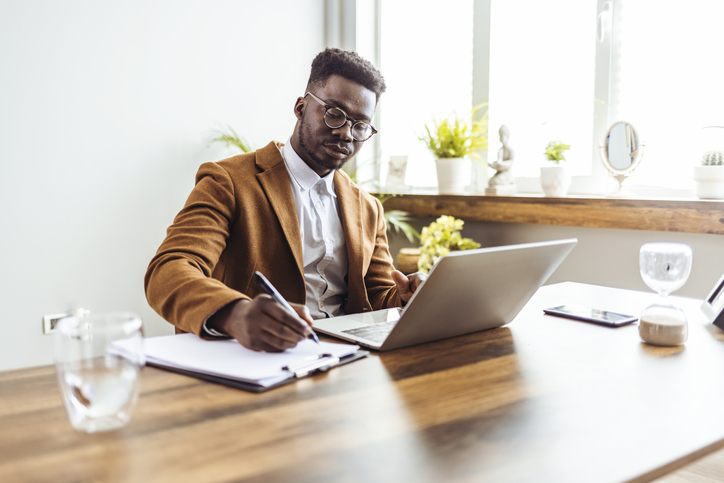 A man reviewing retirement investment options to generate income.